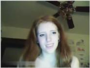 Redhead teen masturbates on Skype using hairbrush